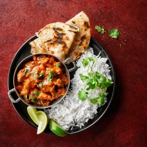 Butter Chicken combo with rice, naan , dessert and a pop